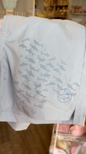 Properly Tied just got even BETTER! Our newest swim trunks now have water activated technology that magically turn his favorite trunks into a SHARK ATTACK! Sizes 2-6 now in store and online! 🦈 | Sprout Children's Shop
