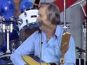 3M views · 77K reactions | George Jones performs Tennessee Whiskey (long before Chris Stapleton released his version) live from Farm Aid 1985 with special guest David Allan Coe! | Center Stage Magazine | Facebook