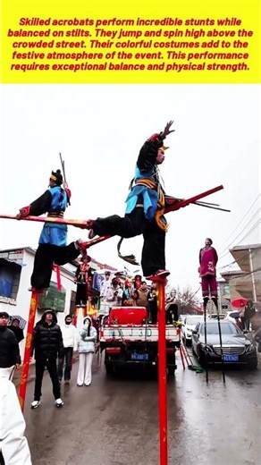 Traditional Street Acrobatics Performed On Tall Wooden Walking Stilts