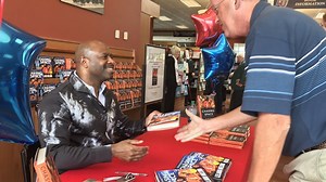 "Don't give up:" Local astronaut gives advice to kids while signing copies of his book