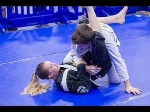 BJJ Girl Wins With "Hateful" Triangle Vs Boy