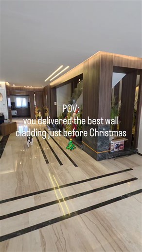 Soud Alfakeer on Instagram: "the transformation of this villa entrance was santa's gift for our beloved clients. #wallcladding #woodcladding"