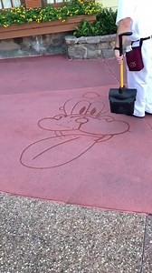 9.7M views · 37K reactions | A Pluto water drawing to call our very own!  While just sitting off to the side by ourselves in Magic Kingdom this morning, this awesome Cast Member named Matt came up and decided to draw Pluto for my wife. It’s a simple gesture, but shows a lot of talent and just overall kindness. | Doctor Disney | Facebook