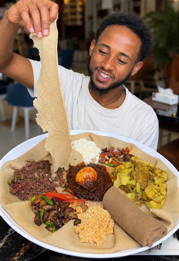 📌A Lounge & Restaurant - ወሎ ሰፈር ከኢንሳ ፊት ለፊት ገባ ብሎ - A Combo 2200 - ⁠Grilled Chicken 1900 - ⁠Fish Dulet 1300 - ⁠Ham & Cheese 720 - ⁠French toast with ham & cheese 1000 #ውሎከnatiጋር #foodreview