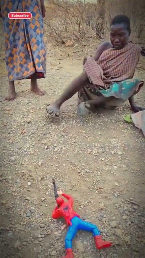 Hadza grandmother is afraid of toy dolls #africanculture #funny #africanheritage #hadzatribe #usa