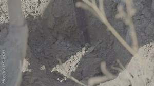 Farmers dig the earth with a shovel and crowbar. Fertile soil. Hand labor, agriculture, cultivation, recultivation, tillage concept. Slow Motion 100 fps