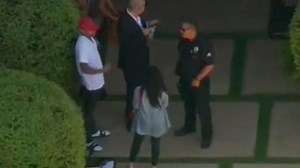 The moment Chris Brown emerges from house after ten-hour siege