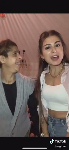 young girl lift and cradle carry her mom in tiktok