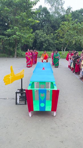 participant skillfully navigates the football through a colorful obstacle course, aiming for the heart-shaped goal ! 💖 #sportsontiktok #tiktoktainment