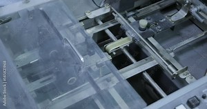 folding machine folds printed offset sheet in print house