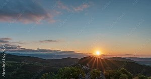 Time lapse of clouds and sunrise in the mountains, Formation of cumulus clouds, beautiful summer landscape