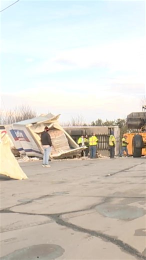 Officials say a tractor-trailer hauling butter was traveling on North Park Drive in the Humboldt Industrial Park when its trailer was struck by a train.