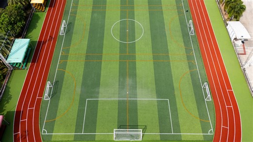 Track athlete faces charge after video of racer hit with baton