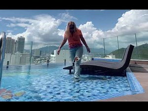 Elena pool orange shirt and jeans