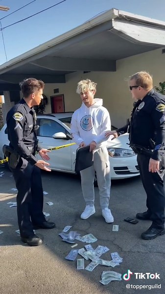 $100,000 Cash Drop Prank in Front of Cops