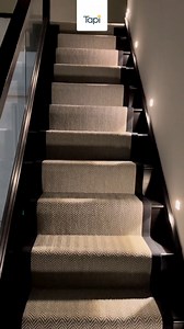 Now THIS is what you call a stair runner! Our Herringbone 'Flatweave Classic' carpet is styled gorgeously - black and beige are a match made in heaven. To browse our full carpet collection visit our website below. (via: @selfbuildsilvertrees) https://bit.ly/3K49PIg | Tapi Carpets & Floors