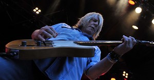 Death announced of Woking's Status Quo rocker Rick Parfitt