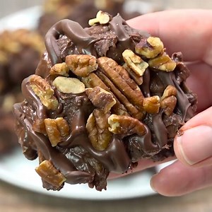 9.9K views · 689 reactions | Turtle chocolates are an easy holiday treat that you won’t be able to stop eating! RECIPE ➡️ https://www.theslowroasteditalian.com/crockpot-turtles-candy-recipe/ | The Slow Roasted Italian | Facebook