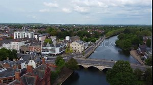High Angle Footage of Historical Bedford City of England During Sunny Day of 28-May-2023. The Footage Captured with Drone's Camera from Medium High Altitude over the City and River Ouse and Station.