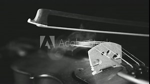 Close up smoke coming out from the violin and bow in the black background, Lowlight, Cinemagraph