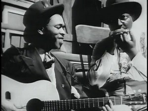 6.4K views · 362 reactions | Brownie McGhee remembered “Red River Blues” being the first blues song he ever heard his father play. Here he is in 1948 with his musical partner Sonny Terry on harmonica performing the song in footage from the Library of Congress. | Blues Compartido | Facebook