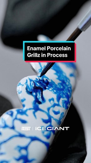 A custom enamel porcelain grillz is currently being crafted, 🤘💪 bringing ceramic art to your jewelry. 🎨 Enjoy fast processing time and a satisfaction lifetime guarantee. 🔥 DM us to begin the process today. . . . . . #theigtgrillz #icegiant #diamondgrillz #goldteeth #icedout #goldgrillz #customgrillz #vvsdiamonds #princesscut #icedoutgrillz #customjewelryfactory #hiphopjewellerymaker #hiphopjewelryfactory #hiphopjewelrymaker #icedjewelry