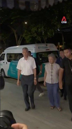 Senior Minister Lee Hsien Loong and his wife Ho Ching arrive at Dr Lee Wei Ling's wake