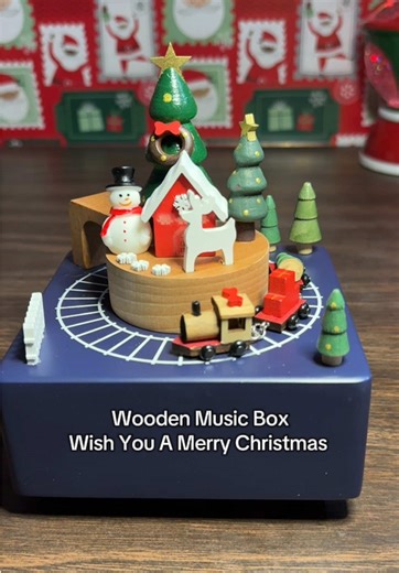 Old-school holiday charm ✨ A wooden music box with a spinning train, playing ‘We Wish You a Merry Christmas #tiktokshopblackfriday #christmasdecor #musicbox #holidaysecor #woodenmusicbox