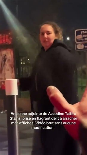 She's tearing down posters of candidates she doesn't like... Caught red-handed! How embarrassing!