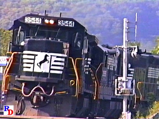 An eastbound loaded coal train that has been followed since departing Bluefield, WV is seen at Glen Lyn, Virginia. shortly after, a westbound with some older GE power arrives. From the BKVP show "Horses Horns & Hoppers" https://rfd.video/Horses | Railfan Depot