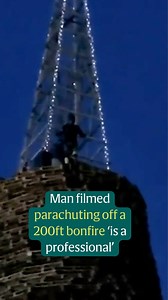 257K views · 737 reactions | Bonfire builders have said a man recorded parachuting off a 200ft bonfire in Larne, Northern Ireland, on Monday evening was a professional base jumper, and 'not some egite (eejit) with a parachute' | Irish Independent | Facebook