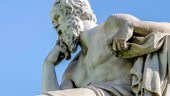 Close Up Statue of the Philosopher Socrates on Sky Background...