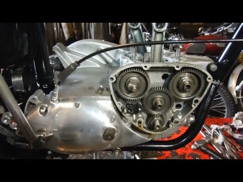 Triumph T120TT - Timing cover and oil pump removed, crank end feed bore looks small.