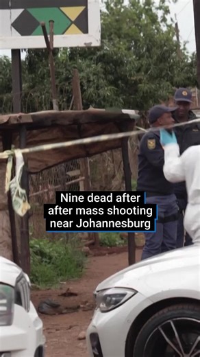 Nine people have been killed in a mass shooting at a pub near Johannesburg in South Africa. Gunmen reportedly pulled up outside the Kwanoxolo bar in Bekkersdal, a township 28 miles outside the country’s largest city, just before 1am local time. Authorities said around a dozen were riding in a white minibus and silver sedan when they opened fire at the patrons. At least 10 other people were wounded in the attack, South Africa’s second mass shooting in three weeks. #southafrica #johannesburgsoutha