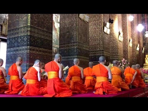 Buddhist afternoon praying in bangkok temple