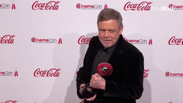 Lindsay Lohan stuns in a classic black gown at CinemaCon 2025