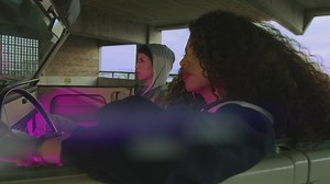 Urban women looking at the camera in a car - Free Stock Video