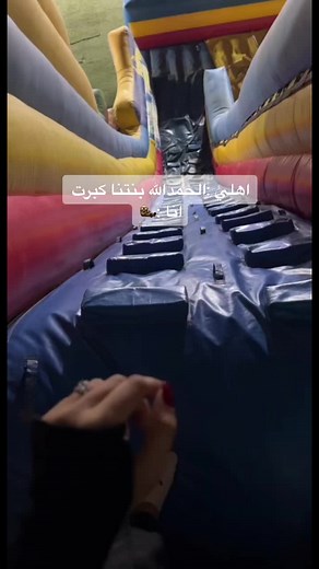 Exciting Nighttime Fun on a Colorful Inflatable Slide