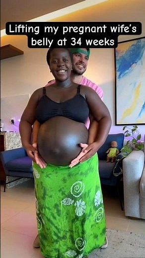Lifting my pregnant wife’s belly at 8 months… #shorts