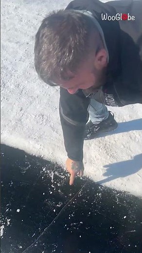 Epic Ice Slide Fail: Man Cracks Ice While Sliding || WooGlobe