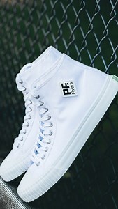 The Center has been a PF. Flyers icon and classic basketball silhouette for nearly a century, and this version of the Center Hi is a modernized take on the original. Since 1937 when we debuted the first insole designed specifically for sport shoes, our shoes have found balance between form and function. With a mid-cut upper, our distinctive ribbed toe guard, a durable rubber outsole, and the feeling of Posture Foundation comfort, we merged our heritage design with modern-day street style. Shop n