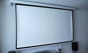 How to Install a Wall Mounted Projector Screen to Avoid a TV