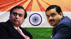 India has pledged to reach net-zero by 2070 despite its massive reliance on fossil fuels. Its two richest men, Mukesh Ambani and Gautam Adani, are competing to dominate that new green economy. https://trib.al/SSPHB3E | Bloomberg