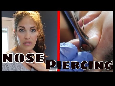 Nose piercing with needle at home