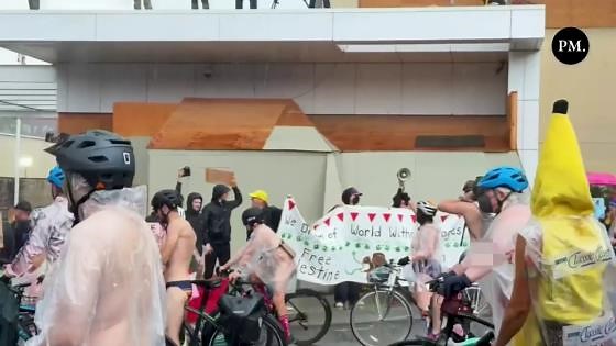 Bare-bottomed bikers roll through rain to shout at feds in blue city's latest anti-ICE stunt