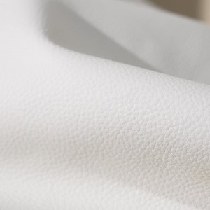 The Aurélien AUR3 Sneaker. Minimal in form, rich in detail. Embossed rubber soles ensure lasting comfort, while gold satin accents add a signature note of sophistication. | Aurélien