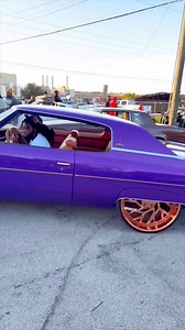 72 Chevy Donk on Rosegold 26’s Riding thru the Carshow