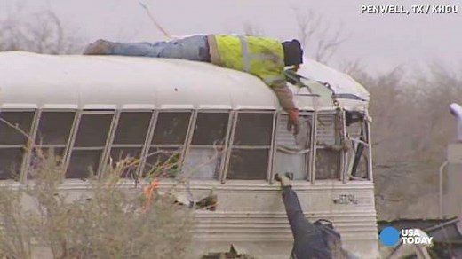 Prisoners chained together as bus crashed into train