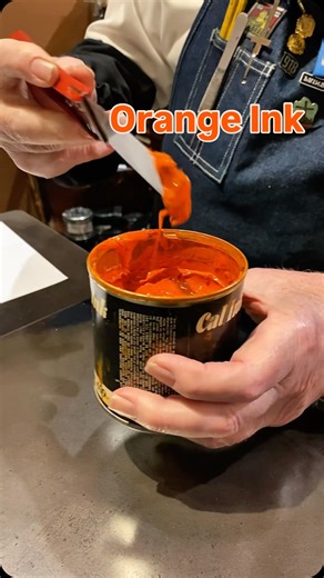 Showing up close rolling out orange oil base ink with a brayer on the ink stone in preparation for some letterpress printing in the print shop exhibit at the Sacramento History Museum. As Howard demonstrates, this is done to create an even layer of ink on the ink stone and the brayer. The remaining ink at the top of the stone will gradually be rolled out throughout the morning as we’re printing. #orange #ink #SacHistoryMuseum #sacramento #museum #history #letterpress #printingpress #asmr #printi