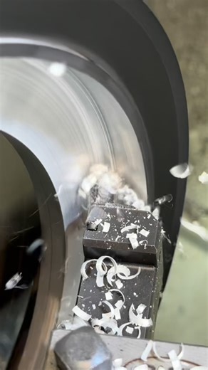 Adam Booth on Instagram: "Machining a 1/8” corner radius in the Harley pulley that we’re modifying. Using my @waltertools MX22 with full radius insert and running the lathe in reverse. #abom79 #manualmachining #machineshop"